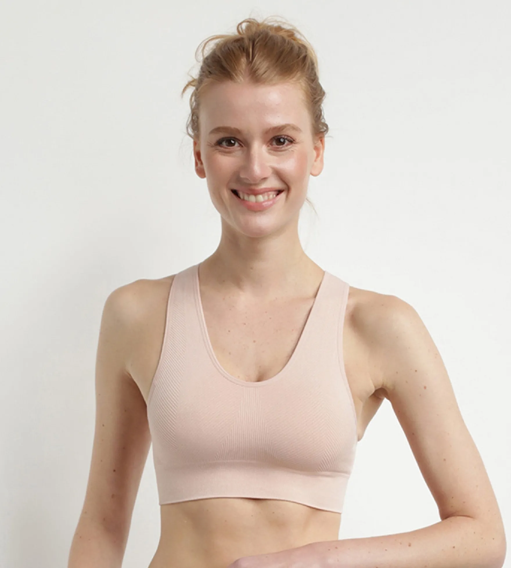 Brassière sans coutures rose amande chiné Dim Sport