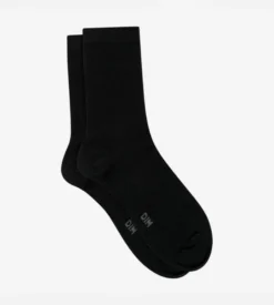 Chaussettes unies noires en laine douce Femme