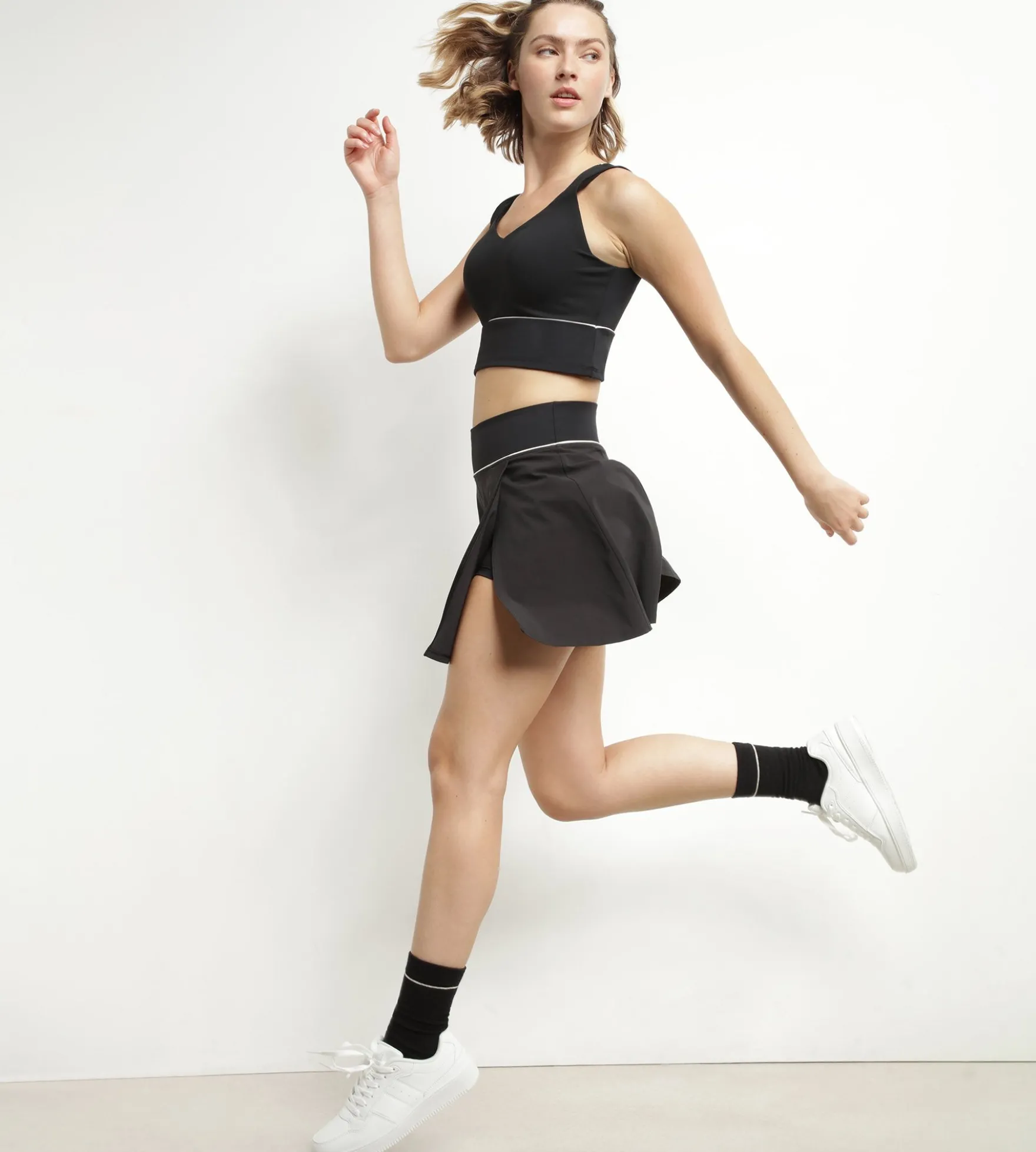 Jupe short de sport femme en microfibre Noire Dim Move
