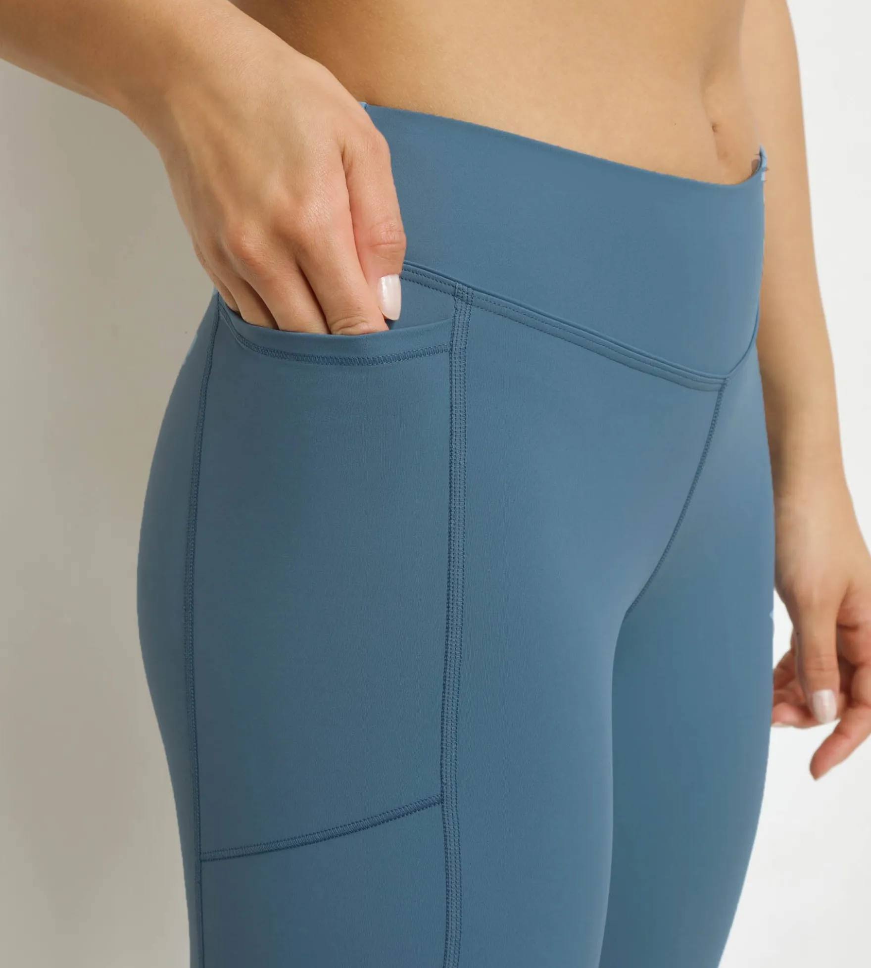 Legging de sport femme court en microfibre Bleu Jean Dim Move